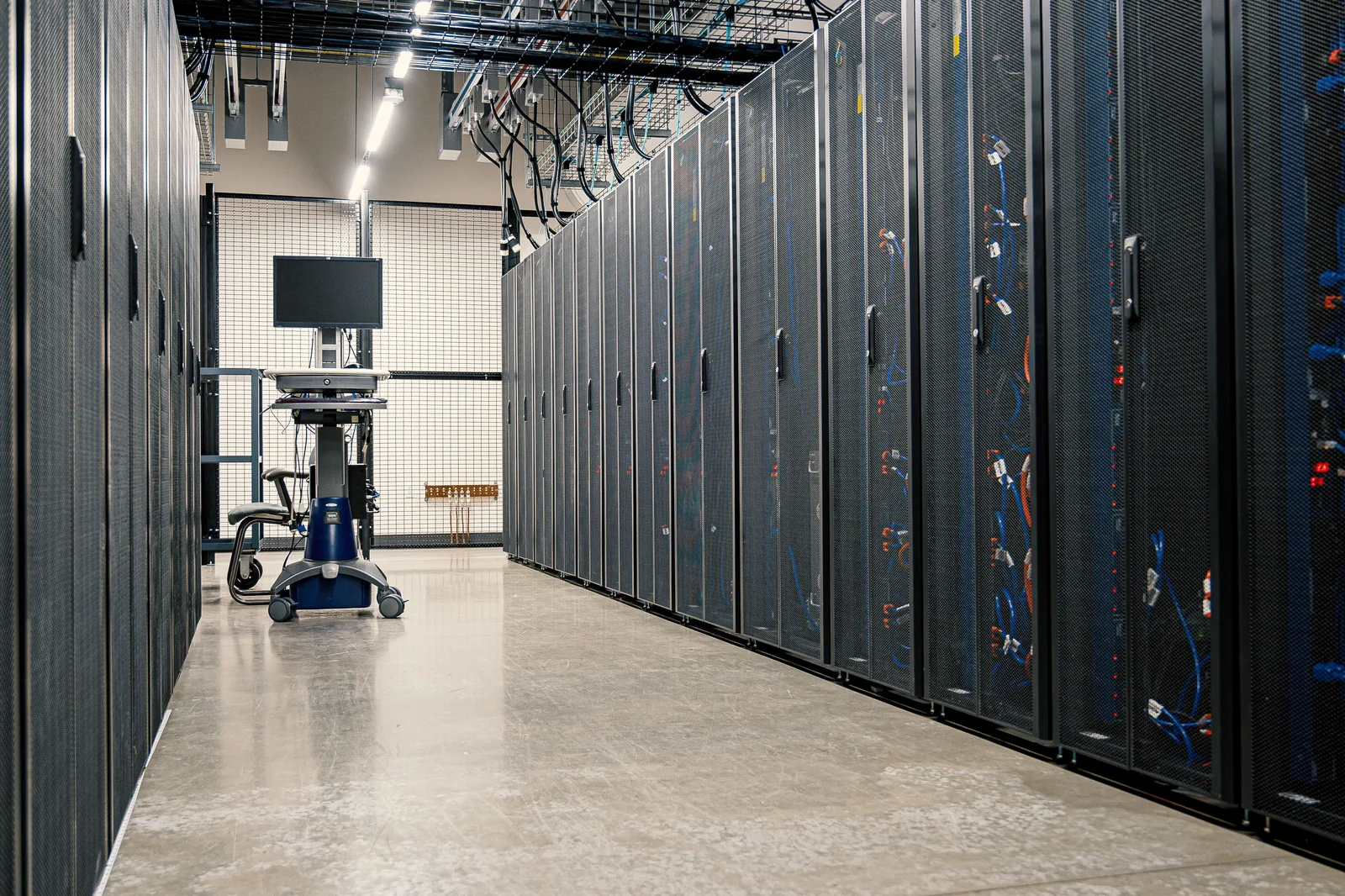Enterprise data center aisle illustrating infrastructure environments supported through field services